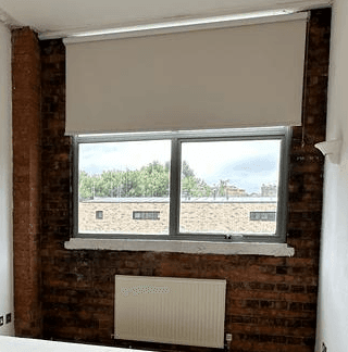 Brick pillar with mould, before treatment