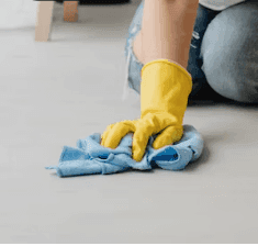 Wiping a surface with a cloth